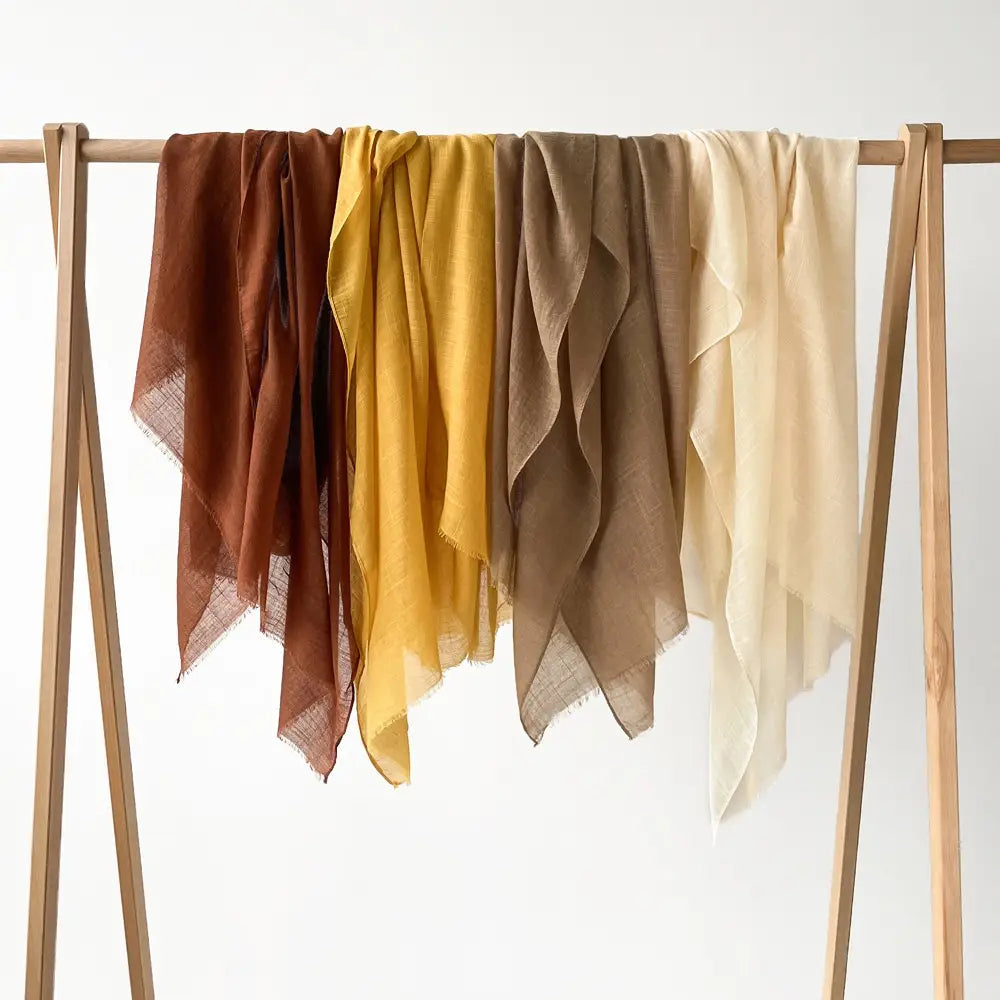 Hijab musulman en coton flammé – Écharpe avec pompons 180×80cm en différentes couleurs.