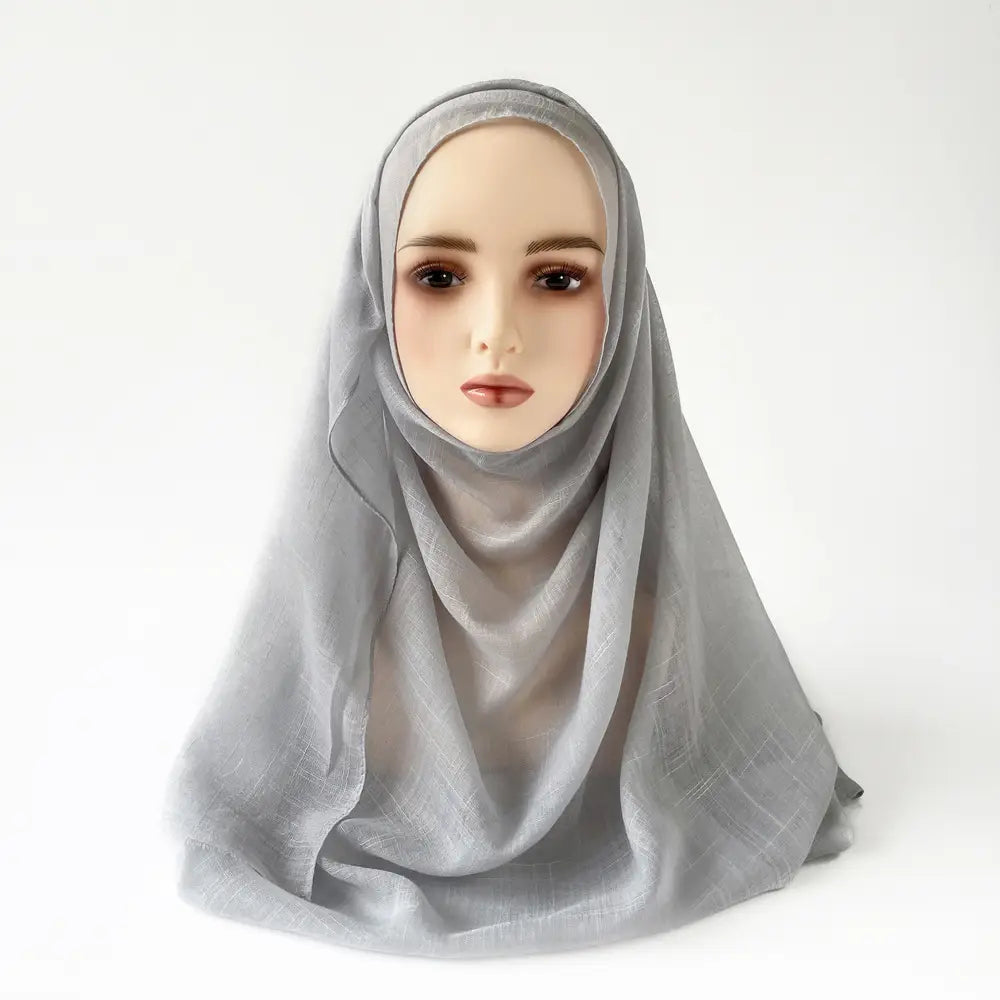 Hijab musulman en coton flammé – Écharpe avec pompons 180×80cm en différentes couleurs.
