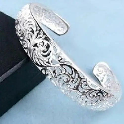 Swirling Hollow Bangle - Silver